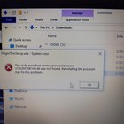 Please help me! I'm trying to download origin and I keep getting this message along with... 1Rb7IwWETDJ512eKj3v_EsjvkeTf9d-F_hbL4v87aPc.jpg