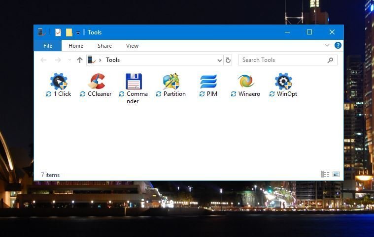 How to remove double arrows next to Icon label in a folder 24fy98k.jpg