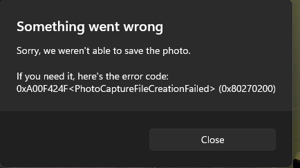I need to know how I can save pictures taken from my laptop in the Windows 11 Camera app. 64a62f23-42ae-4508-bb72-3fab2ab5d213?upload=true.png