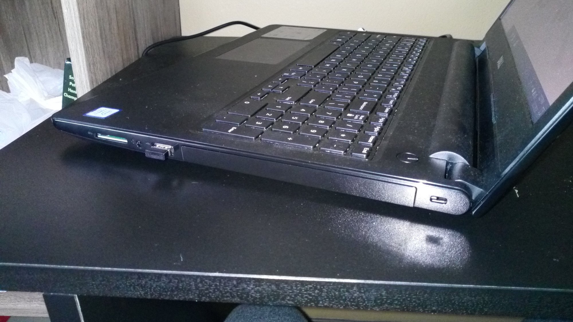 My Dell Inspiron 15 3000 does not have a CD tray or eject button and a CD drive icon in My... 7b7e00cb-0526-4e0b-a1e1-9f4f95c85a39?upload=true.jpg