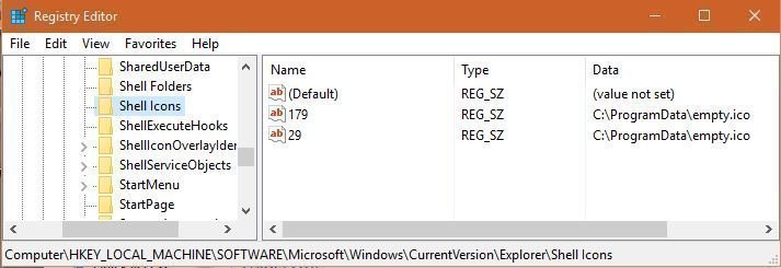 How to remove double arrows next to Icon label in a folder 9e0d60d4-97c5-45b7-af61-3da8eecb0c4f.jpg