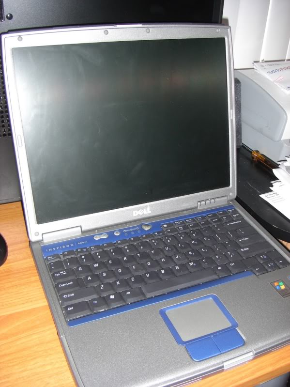 My dell laptop is not recognize the charger and won't charge CIMG9929.jpg