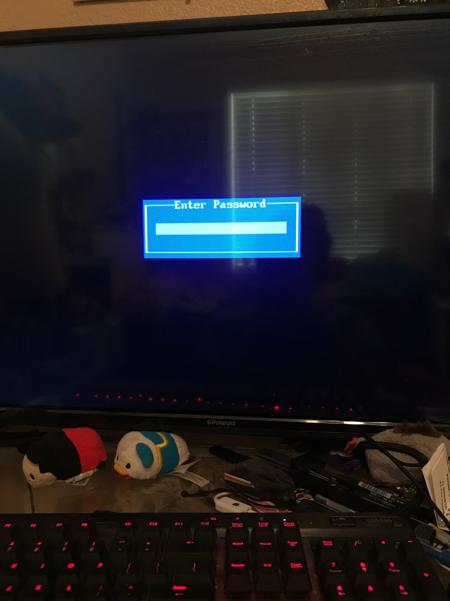 Black screen with small blue dialog box asking for a password. HELP e8ccf8ab-d764-4b2b-9d2d-f23a1c4f3068?upload=true.jpg