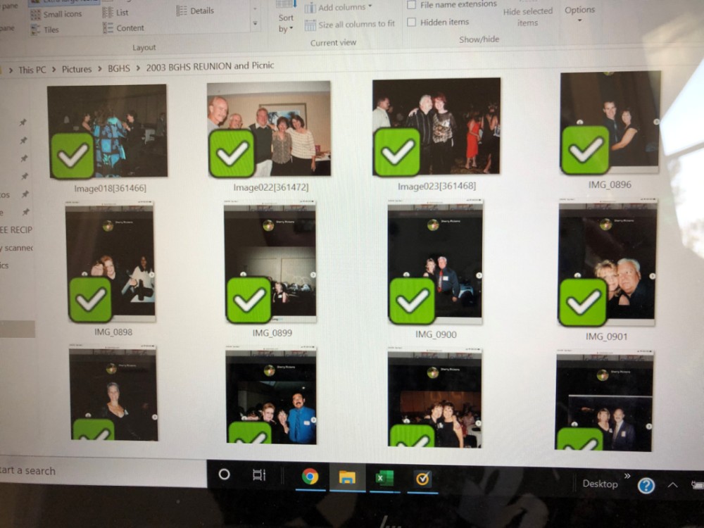 Viewing Photos in Windows 10. How do I remove the green check marks? efea1a75-d3b6-47fc-adb7-75bded6866b8?upload=true.jpg