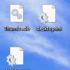 Seeing "thumbs.db" and "desktop.ini" files on my desktop. Not showing hidden folders/files... S4TiBbuHNHsnMPnwIVk8Rg7xG3T2qg5pTfp7R5X8mW4.jpg