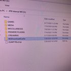 What are these two things and can I delete them? (See comments for more details) TMVCoHxeQu_cWSq0WVlcgBw2gz3PTJun1Ksnq_nNqkU.jpg