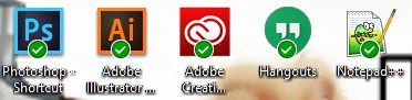 Is there a way to get rid of the red x and green checkmarks from desktop and file icons? Uzik3.jpg