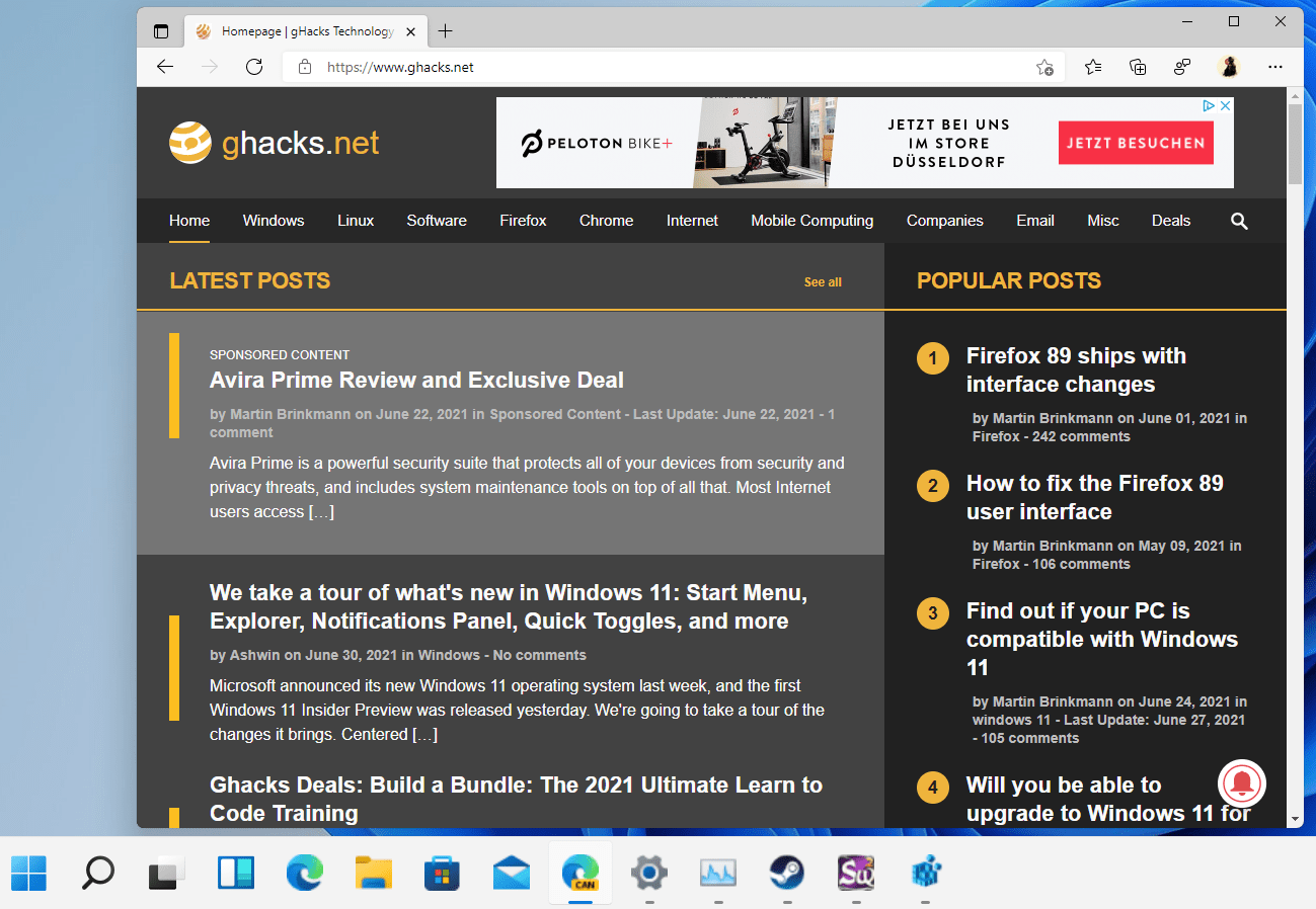 How to change the Windows 11 taskbar size windows-11-taskbar-large-size.png